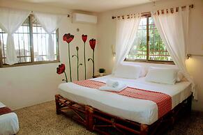 Hostal & Suites Pata de Perro Bacalar