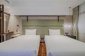 Manxin Hotel Qingdao Zhanqiao