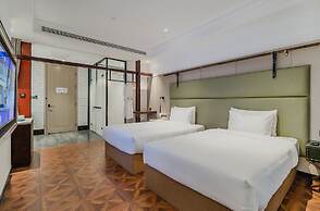 Manxin Hotel Qingdao Zhanqiao