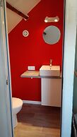 La Longère aux Volets Rouges