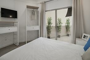 Drapes Design Apartments II by An Island Apart