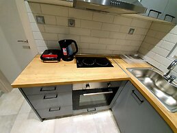 Cosmopolitan Apartments Nilie Suites & Aprts