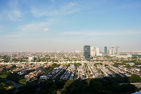 Minimalist Studio Room at Puri Mansion Apartment
