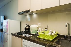 Minimalist Studio Room at Puri Mansion Apartment