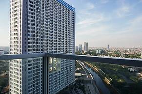 Minimalist Studio Room at Puri Mansion Apartment