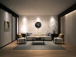 Qianna Jiuhe Boutique Hotel Zhoukou Shop