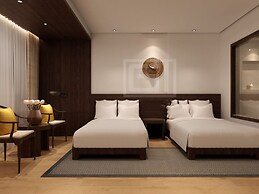 Qianna Jiuhe Boutique Hotel Zhoukou Shop