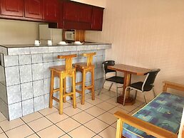 Prado Inn & Suites