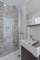 Sunny Apartment with Patio, By TimeCooler