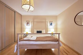 Renovated and Spacious Duplex Apartment With Patio, By TimeCooler