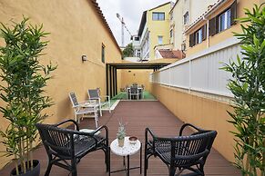 Renovated and Spacious Duplex Apartment With Patio, By TimeCooler