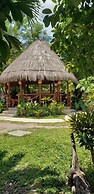 Cabanas k'iin Yéetel Há Bacalar