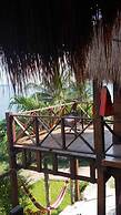 Cabanas k'iin Yéetel Há Bacalar