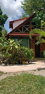 Cabanas k'iin Yéetel Há Bacalar