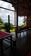 Cabanas k'iin Yéetel Há Bacalar