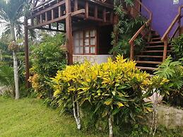 Cabanas k'iin Yéetel Há Bacalar
