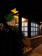 Cabanas k'iin Yéetel Há Bacalar