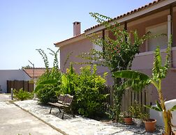 House of Paradise in front of the golf court-sea