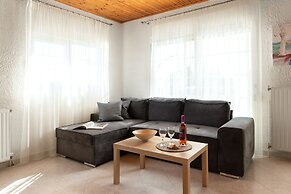 House of Paradise in front of the golf court-sea