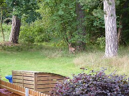 Ferienwohnung im Wald mit Kamin