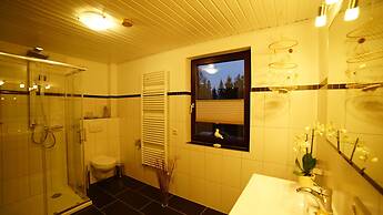 Ferienwohnung im Wald mit Kamin