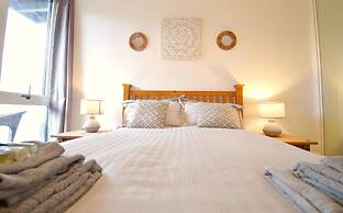 MK Hub Apartment with Oak Furniture