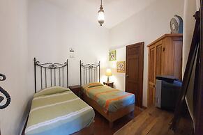 Capital O Hotel Al Son de los Santos - Hostel