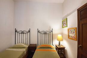 Capital O Hotel Al Son de los Santos - Hostel