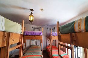 Capital O Hotel Al Son de los Santos - Hostel