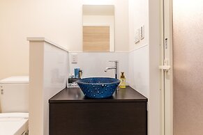 Mr.KINJO Miki24 in front of Makishi Station