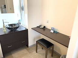 Mr.KINJO Miki24 in front of Makishi Station