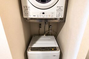 Mr.KINJO Miki24 in front of Makishi Station