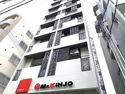 Mr.KINJO Miki24 in front of Makishi Station