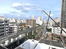 Mr.KINJO Miki24 in front of Makishi Station