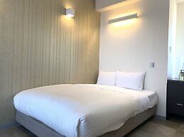 Mr.KINJO Miki24 in front of Makishi Station