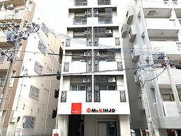 Mr.KINJO Miki24 in front of Makishi Station