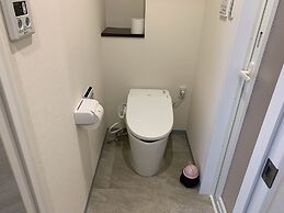 Mr.KINJO Miki24 in front of Makishi Station