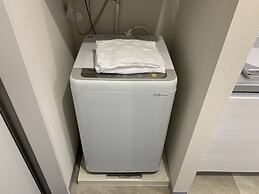 Mr.KINJO Miki24 in front of Makishi Station