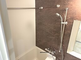 Mr.KINJO Miki24 in front of Makishi Station