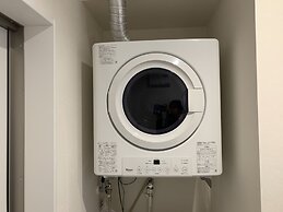 Mr.KINJO Miki24 in front of Makishi Station