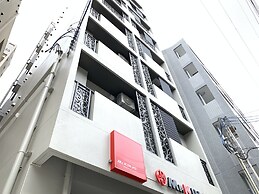 Mr.KINJO Miki24 in front of Makishi Station