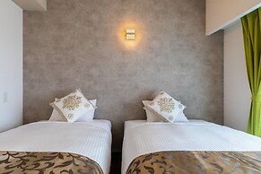 Mr.KINJO in front of Manza Beach