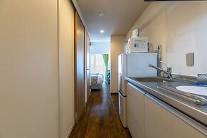 Mr.KINJO in front of Manza Beach