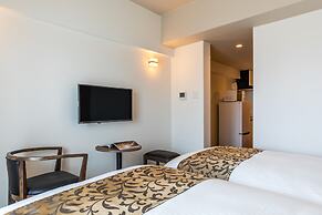 Mr.KINJO in front of Manza Beach