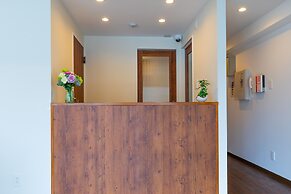 Mr.KINJO in front of Manza Beach