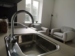 Det Gamle Apothek Apartments