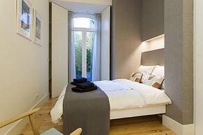 JOIVY Design heaven in Baixa - 2BR Apt w/workspace