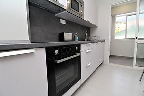 Grey Apartment in City Center with Sea View