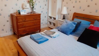 Chambre dans une maison pleine de vie