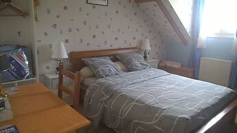 Chambre dans une maison pleine de vie